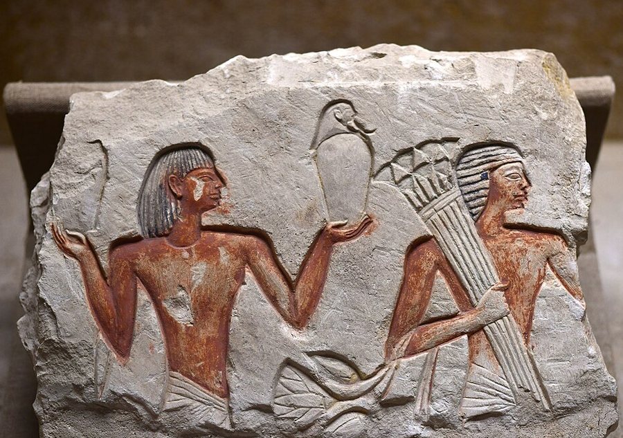 Men with lotus bouquets — original