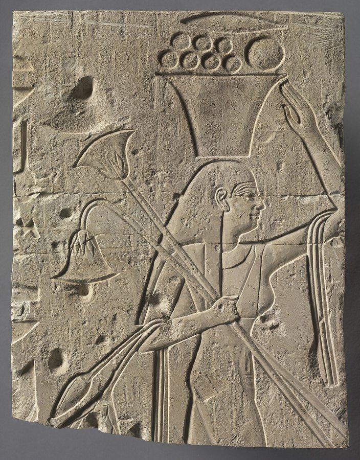 Female offering bearer with lotus — original