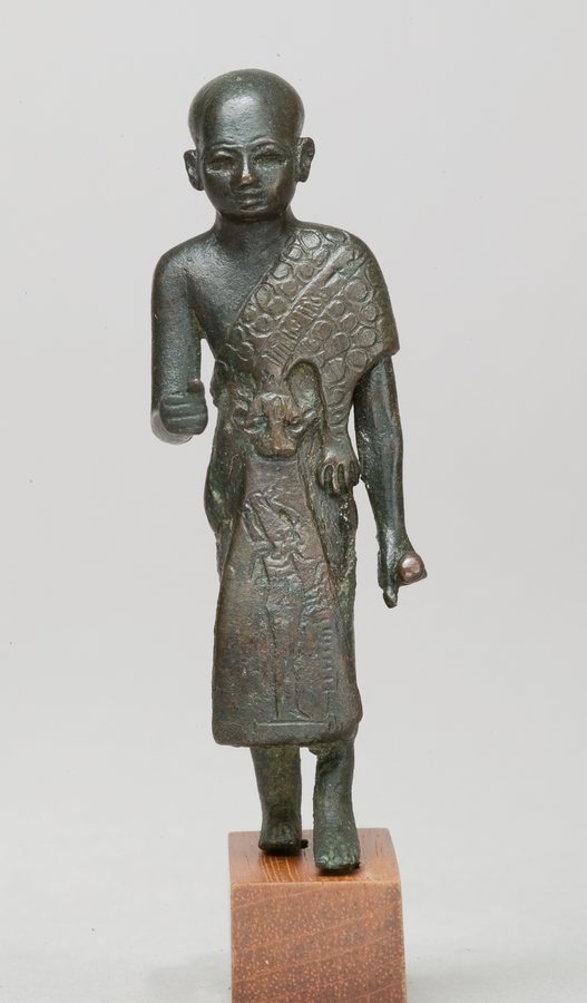 Priest in a leopard-skin cloak with Osiris on his skirt (Met 26.7.1415) — original